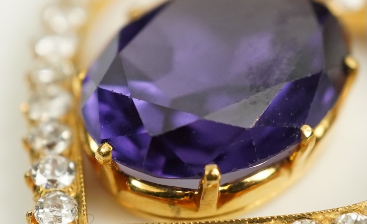 A synthetic sapphire and diamond pendant, mid 20th century